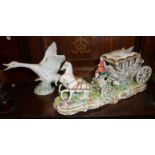 Lladro china swan and a porcelain model of a Continental horse drawn coach with Royal passenger