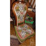 Victorian mahogany balloon-back chair with beadwork seat and back standing on turned legs