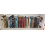 Shelf of Folio Society books and classic novels
