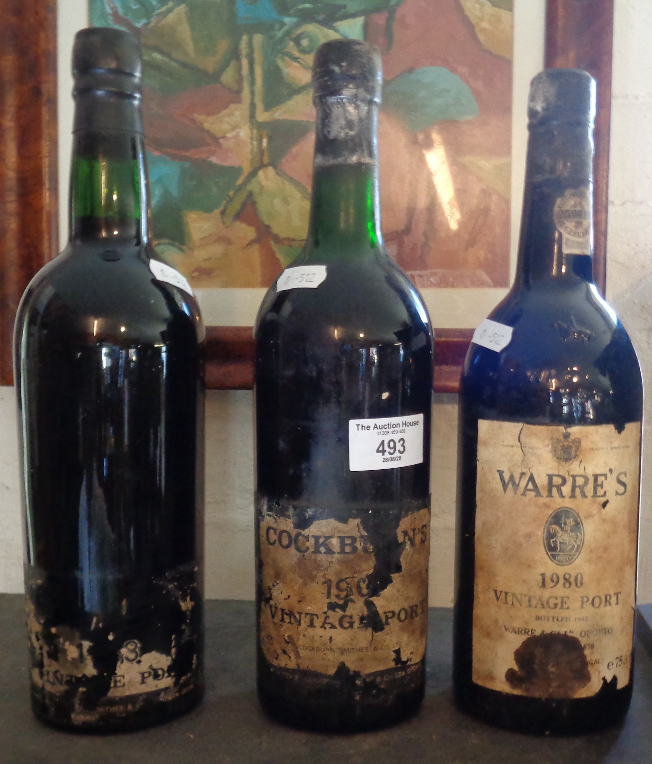 Three bottles of vintage port, Cockburn's & Warre's, 1980 and another