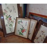 Set of four 20th c. Chinese embroidered pictures of blossoms and birds, signed