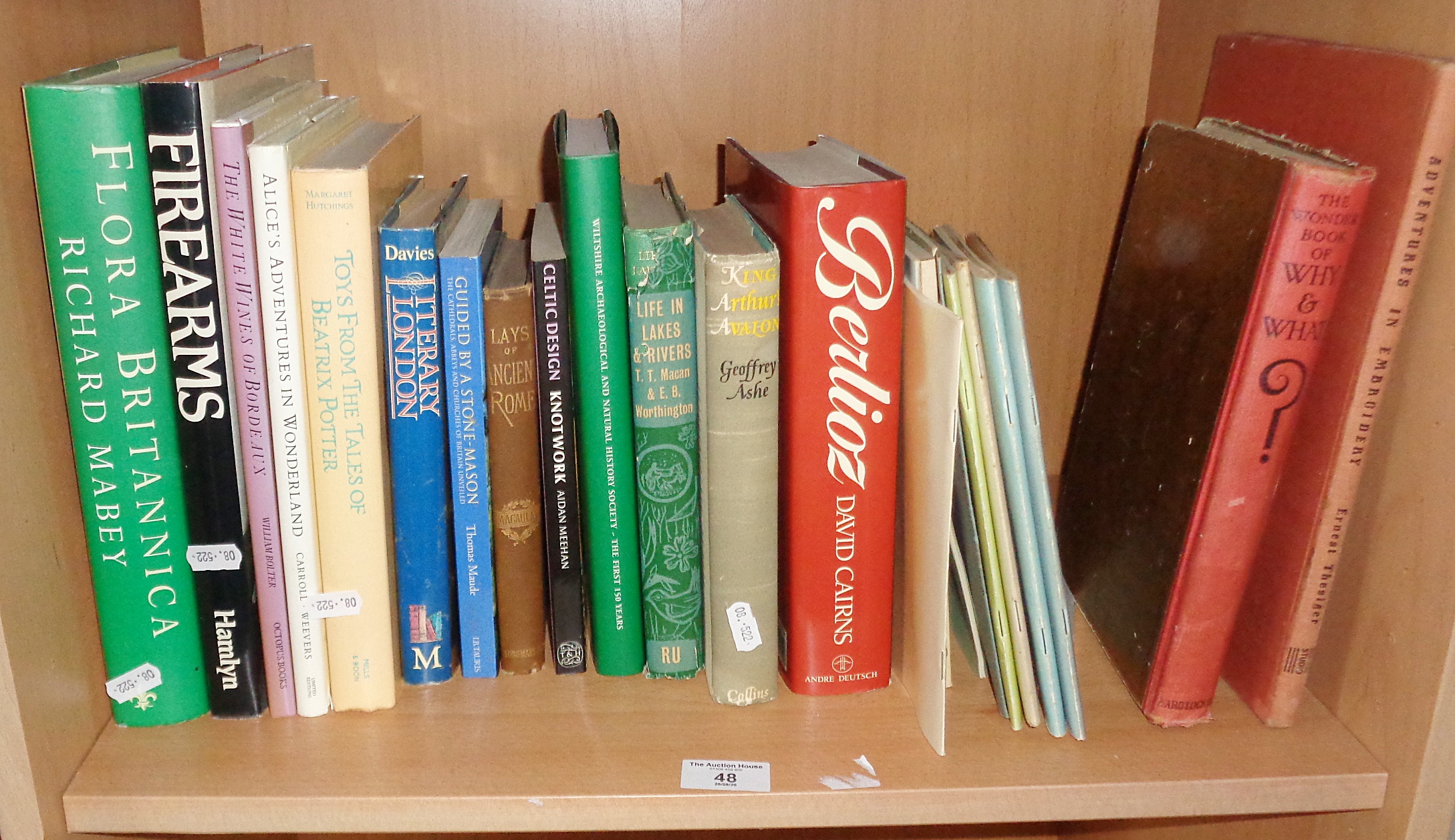 Shelf of assorted books