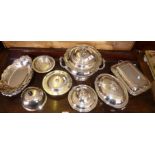 Impressive silver-plated lidded punchbowl, four silver plated entree dishes, and three other dishes