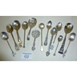 Thirteen hallmarked silver spoons including a tea caddy spoon, a Mexican spoon with a cat finial and