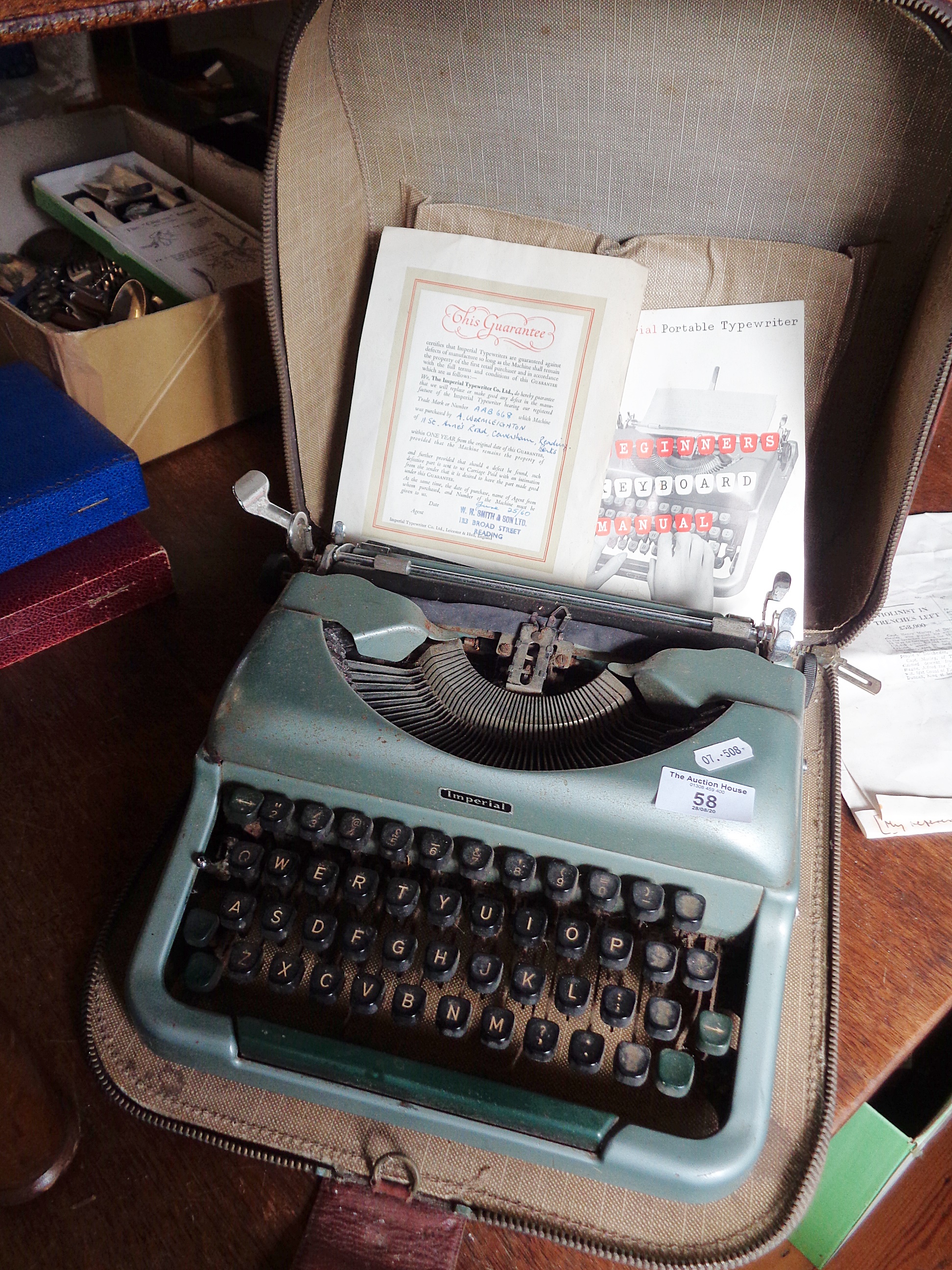 1960's portable Imperial typewriter, with original guarantee!