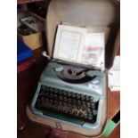 1960's portable Imperial typewriter, with original guarantee!