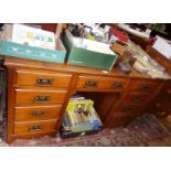 Edwardian mahogany kneehole desk of nine drawers, 4' long