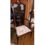 Art Nouveau English mahogany open armchair having high arch topped back with carved centre splat and