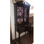 Victorian mahogany serpentine-fronted two-drawer table with astragal glazed two door display cabinet