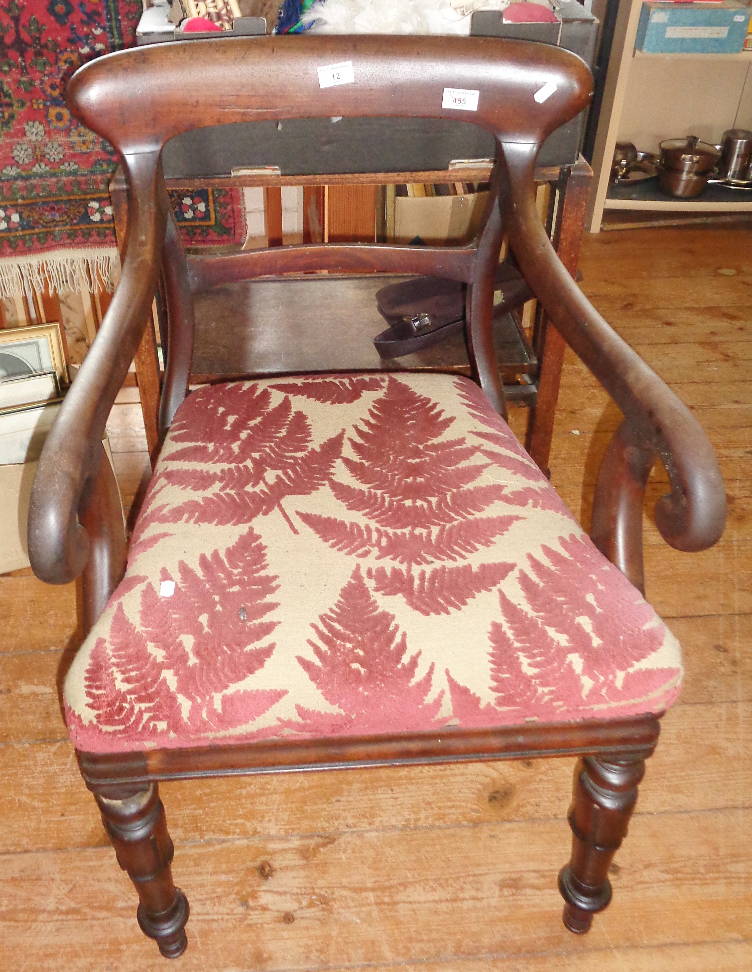 19th c. mahogany scroll-arm library elbow chair on turned and carved legs