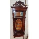 Victorian mahogany narrow wall mirror having carved cornice and shelves with turned supports