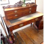 Small Victorian mahogany desk with drawers and gallery over turned and fluted legs