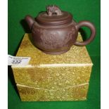Miniature red ware Chinese teapot, with seal mark under and silk covered box
