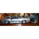 Maisto diecast 1/12 scale model of a Jaguar XJ220 in silver livery