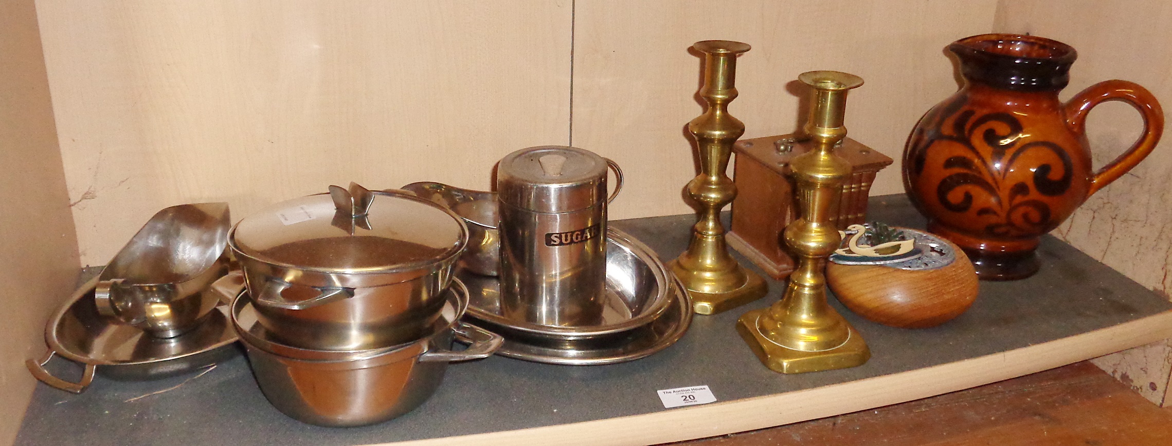 Stainless steel cookware, pair of brass candlesticks etc.