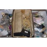 Three boxes of vintage and modern costume jewellery