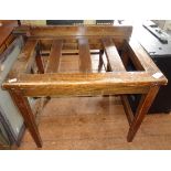 Two oak luggage racks