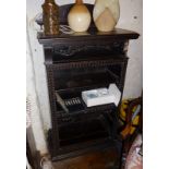 Edwardian ebonised carved oak bookshelves