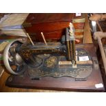 A Vesta German Fiddlebase hand sewing machine. c.1900