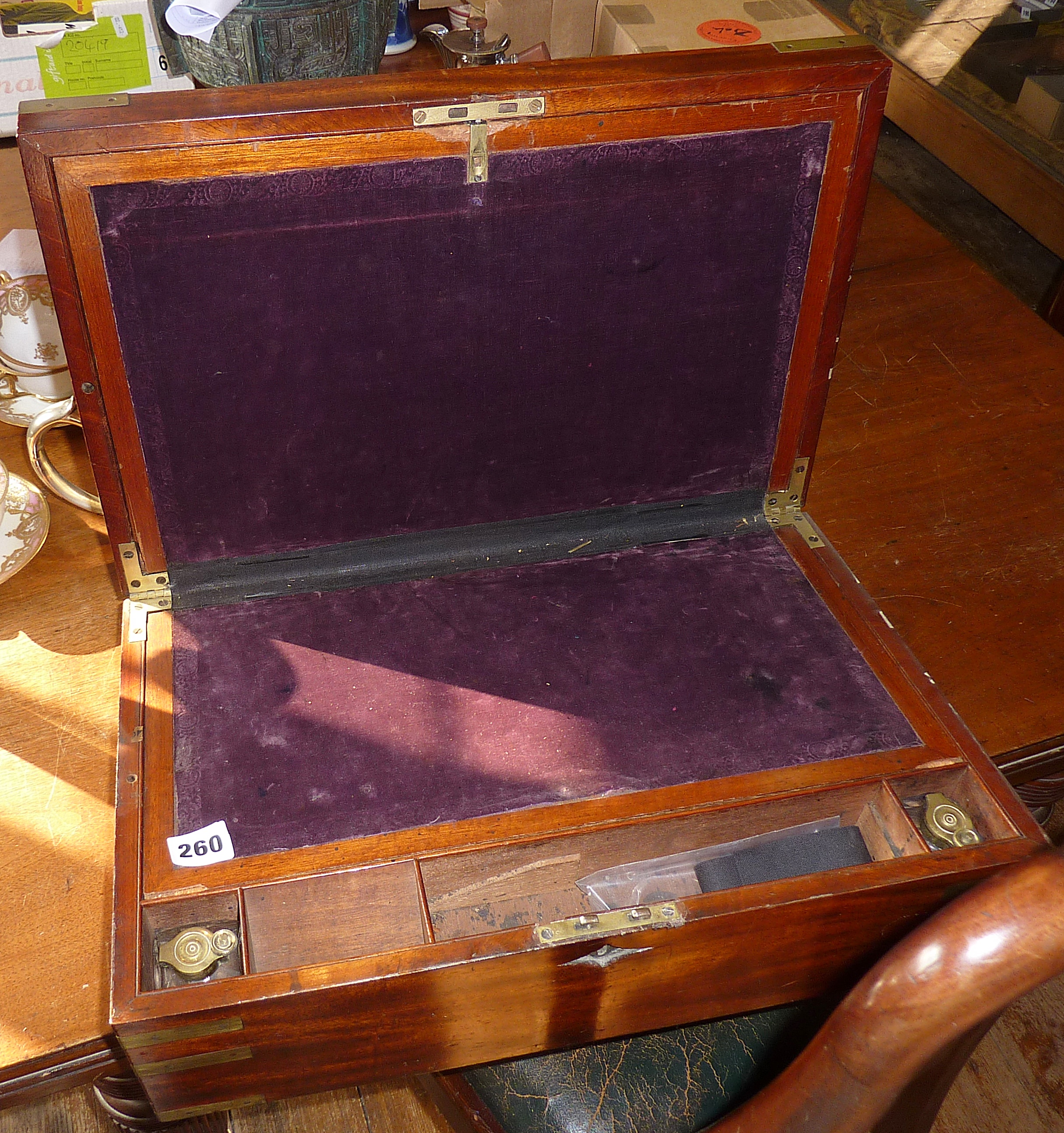 Large brassbound mahogany writing slope with fitted interior, inkwells and drawer