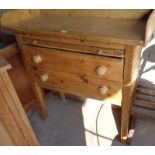 Stripped pine serving table with two drawers, brushing slide and gallery on square legs