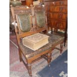 Set of four Victorian carved dining chairs with original embossed leatherette upholstered seats