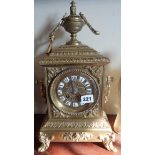 19th c. French ormolu mantle clock having brass dial with enamel numerals