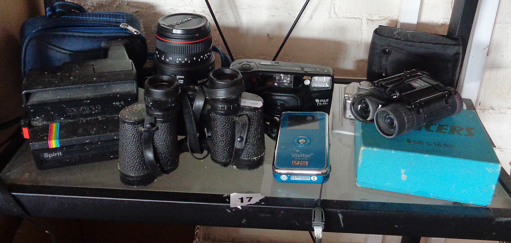 Assorted cameras and binoculars