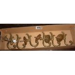 Six Victorian brass coat hooks