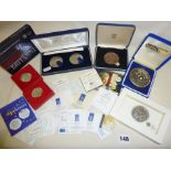 Assorted Royal Mint and other medallions, inc. Lloyds of London centenary, a 1oz silver 2009 UK