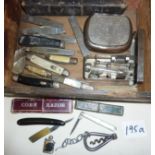 Collection of penknives and pocket knives, miniature lighter, cut throat razors, syringe in case,