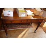 Victorian mahogany side or writing table with two drawers under and turned and fluted legs