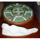 Chinese porcelain hors d'oeuvres dishes on Lazy Susan and a marble reclining buddha