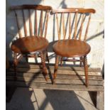 Pair of stick back kitchen chairs and a bench