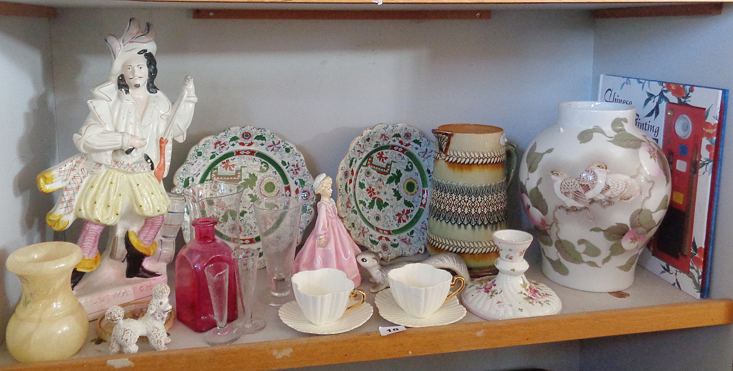 Shelf of assorted china and glass