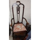 Art Nouveau English mahogany open armchair having high arch topped back with carved centre splat and