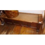 Low oak window seat box with panelled front