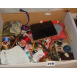 Assorted needlecases and sewing items