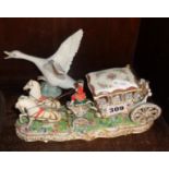 Lladro china swan and a porcelain model of a Continental horse drawn coach with Royal passenger