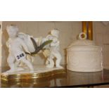 19th c. English porcelain centrepiece of three cupids supporting a scalloped bowl (A/F) and a