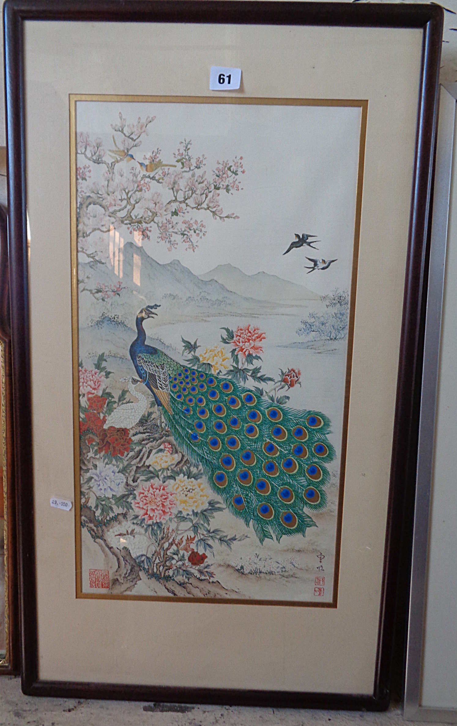 Japanese colour print on silk of peacocks on chrysanthemum bush, signed and stamped 31" x 17.5",