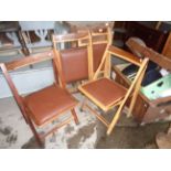 Set of four teak folding chairs