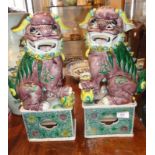 Pair of Chinese Famille Verte Buddhist Lion dogs, 43cm high