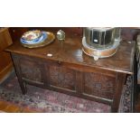 Large oak 18th c. coffer with 3 carved panel front