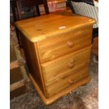 Modern pine bedside chest of three drawers