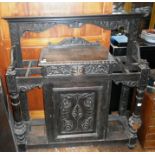 Large carved Victorian Gothic hallstand with stylised Green Man face etc.