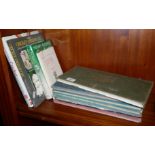 Quantity of old cricket team scorebooks and five books on cricket