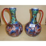 Pair of 18th c. Oriental porcelain ewers