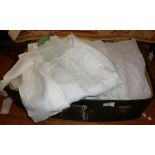 Suitcase of Victorian and later child's nightgowns including lacework examples