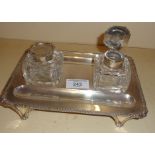 Silver inkstand with pen tray and two silver topped glass inkwells, hallmarked for London 1900 maker